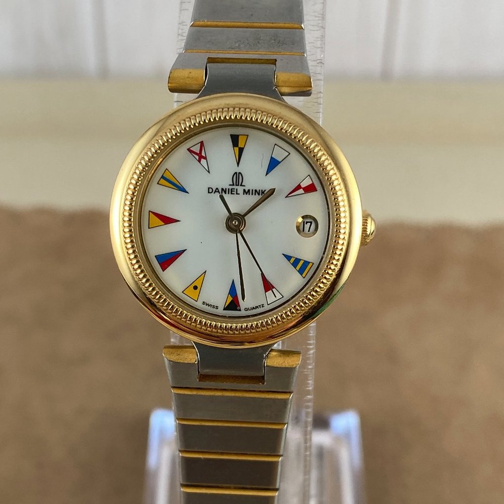 Ahoy! This is a beautiful vintage ladies watch by Daniel Mink nautical flag moti